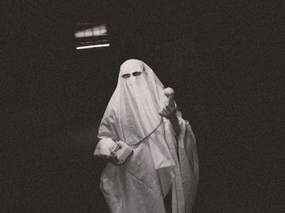 Shadowy figure of a man performing a lift